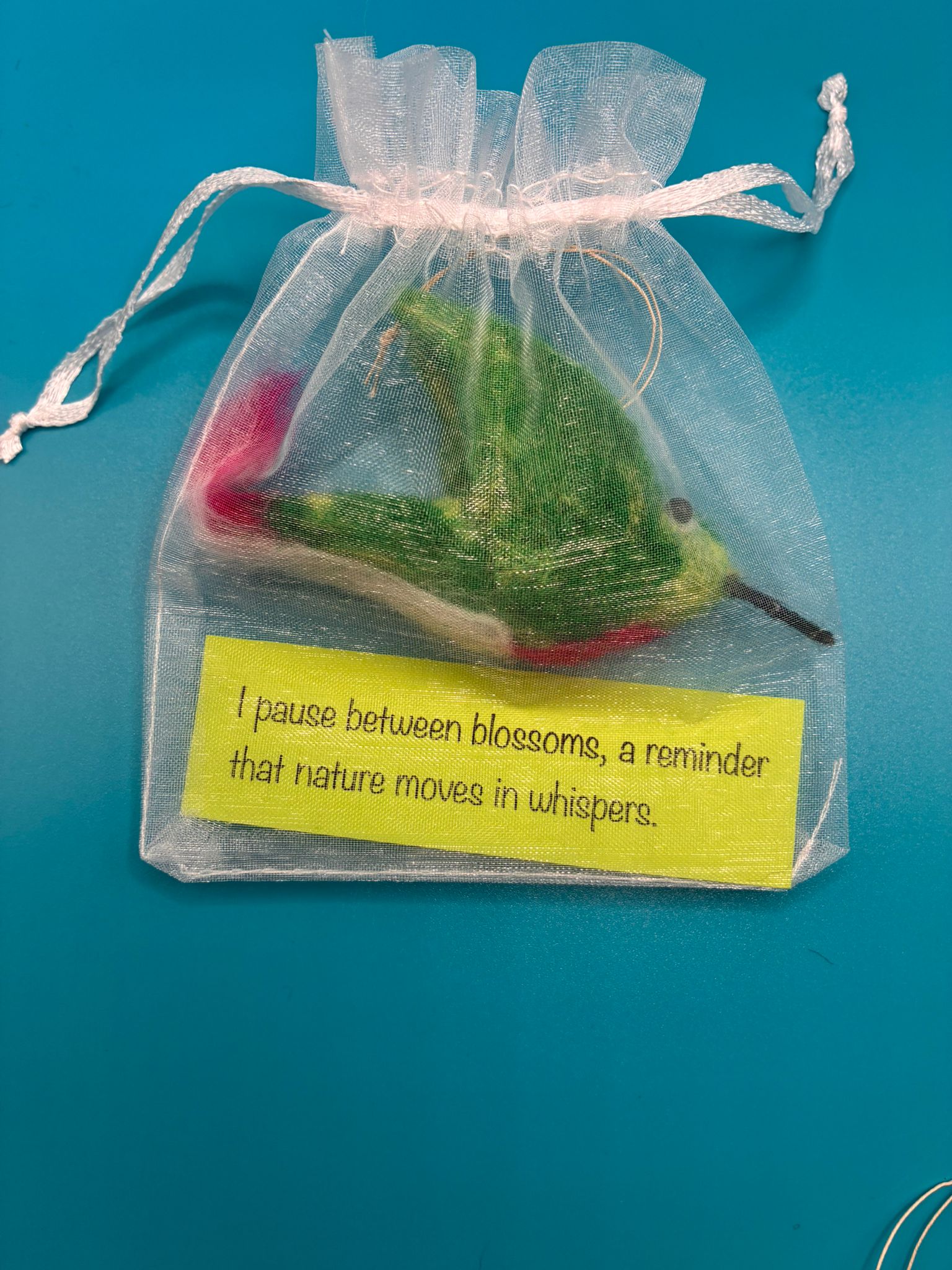 Needle felt hummingbird in organza gift bag with message