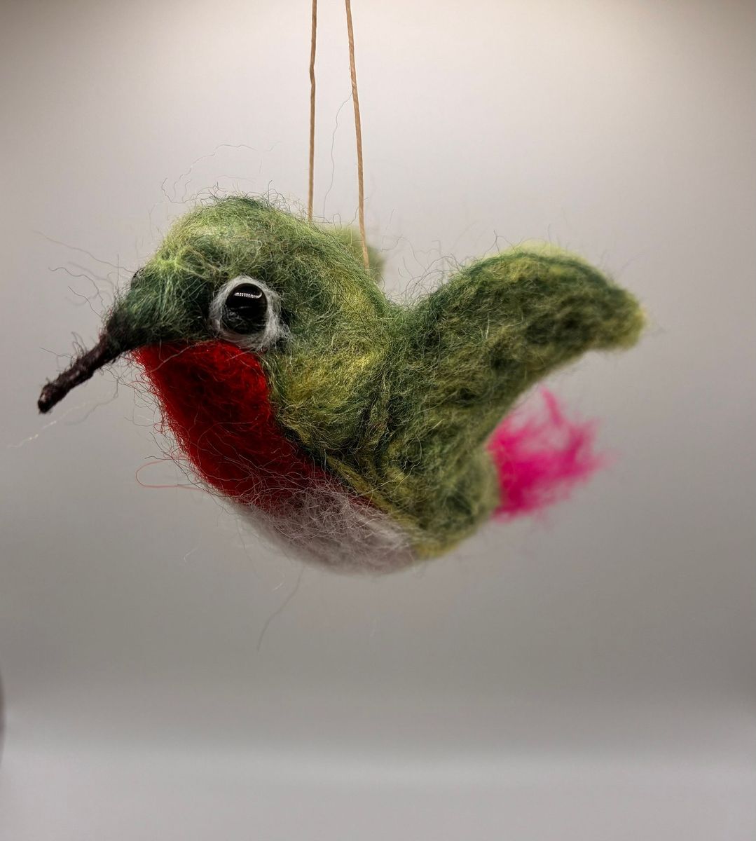 Needle felt hanging hummingbird in green and red