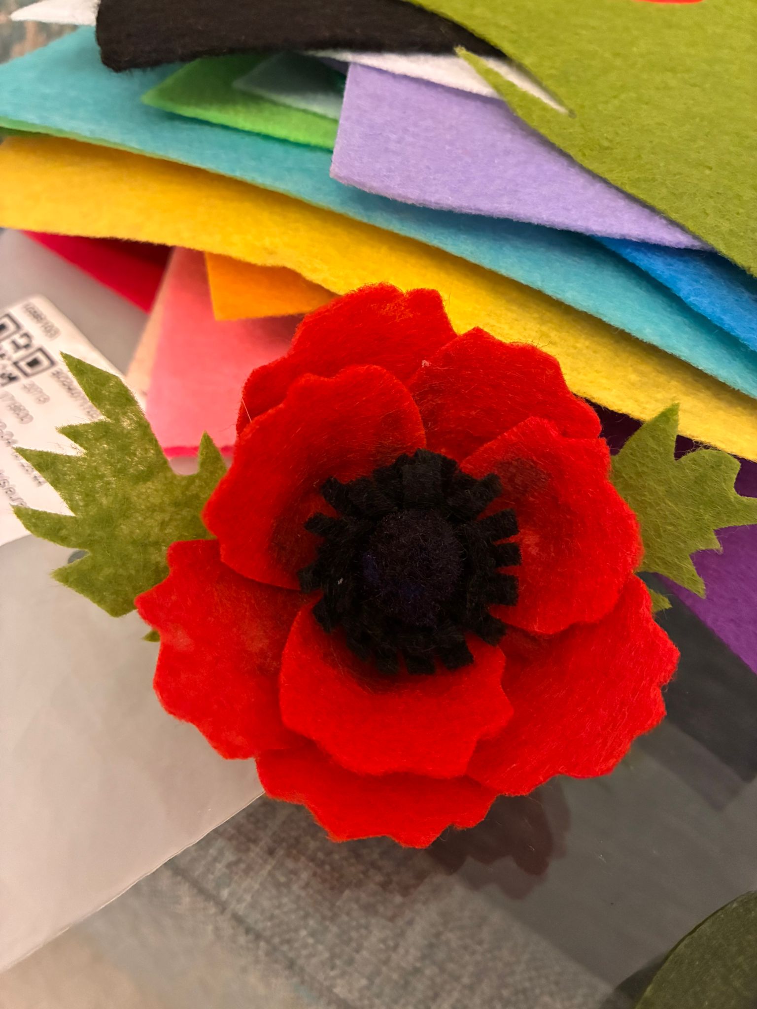 Red felt poppy close-up