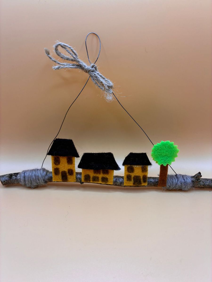 Felt houses and tree on straight hanging twig