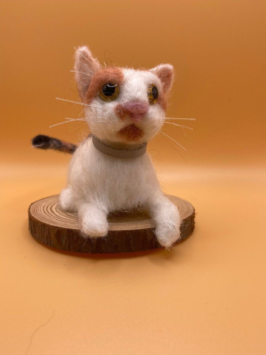 Needle felt white and ginger cat on wood slice